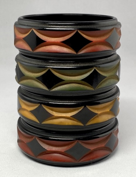 BB38 geometric carved overdyed bakelite bangles